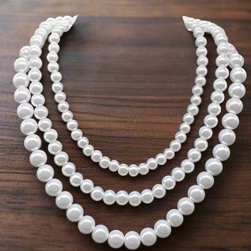 Classic White Pearl Necklace Classic Pearl Necklace, Beads Design, Bead Sizes, White Pearl Necklace, Bead Store, Silver Accents, Bead Designs, Strand Necklace, White Pearl