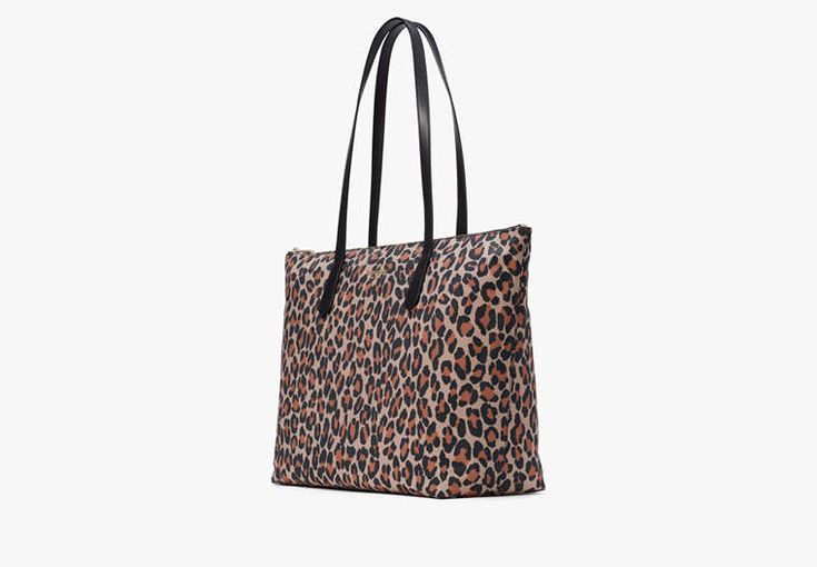 You know this tote holds your everyday stuff like a wallet keys phone sunglasses. It also holds: two red lipsticks $6 in change 11 crumpled receipts an avocado… | Kate Spade Kitt Nylon Leopard Extra Large Tote, Brown Multi Pvc Trim, Kate Spade Outlet, Logo Line, Large Tote, Lipsticks, Tote Handbags, Avocado, Extra Large, Outlet