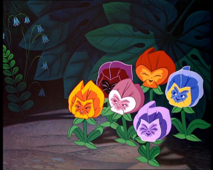 there are many different colored flowers in this cartoon character's face and the background is green leaves