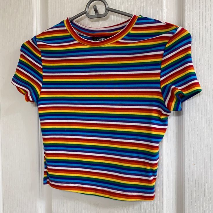 Shein Women’s Rainbow Crop T-Shirt, Size Medium. Never Worn Crochet Rainbow Shirt, Fitted Rainbow Short Sleeve Tops, Striped Rainbow Print T-shirt For Spring, Spring Striped T-shirt With Rainbow Print, Trendy Rainbow Print Striped Tops, Trendy Striped Rainbow Print Tops, Trendy Striped Tops With Rainbow Print, Casual Striped T-shirt With Rainbow Print, Multicolor Rainbow Print Graphic Tee