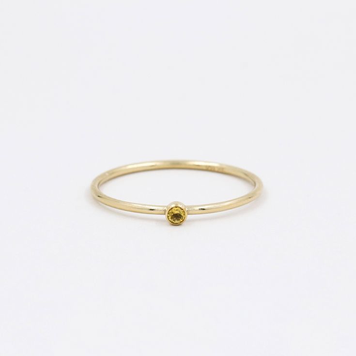 Delicate ring made of gold filled and natural stones. This minimalist ring combines quality and know-how. Worldwide shipping from France. -- Important -- To avoid any inconvenience, please carefully review the descriptions/photos, as well as our FAQ, and make sure to double-check the selected options/shipping address provided before confirming your order. -- Product Features -- - Quantity : Ring sold individually (photos with multiple rings for illustrative purposes only). - Materials : 14k Gold Everyday Gold Solitaire Birthstone Ring, Gold Diamond Ring With Birthstone For Everyday, Gold Minimalist Diamond Ring With Birthstone, Everyday Simple Gold Birthstone Ring, Gold Birthstone Ring With Round Band For Everyday, Everyday Gold Birthstone Ring With Round Band, Gold Citrine Promise Ring, Minimalist Gold Crystal Ring With Simple Design, Gold Rings With Birthstone In 14k Gold Filled