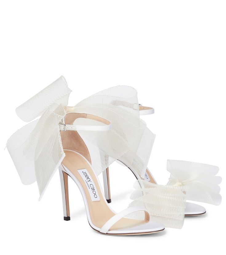 Jimmy Choo - Aveline 100 bow-trimmed sandals - The Aveline sandals from Jimmy Choo are stitched with hand-tied mesh fascinator bows, making them perfect for a special summer occasion. They're made in Italy from cream white grosgrain with leather insoles, buckled ankle straps and 100mm stiletto heels. seen @ www.mytheresa.com Heels With Tulle Bow, Aveline 100 Jimmy Choo, Jimmy Choo White Bow Heels, Jimmy Choo Aveline 100, Shoes With Bows High Heels, White Heels Png, White Jimmy Choo Heels, Jimmy Choo Bow Heels, Jimmy Choo White Heels