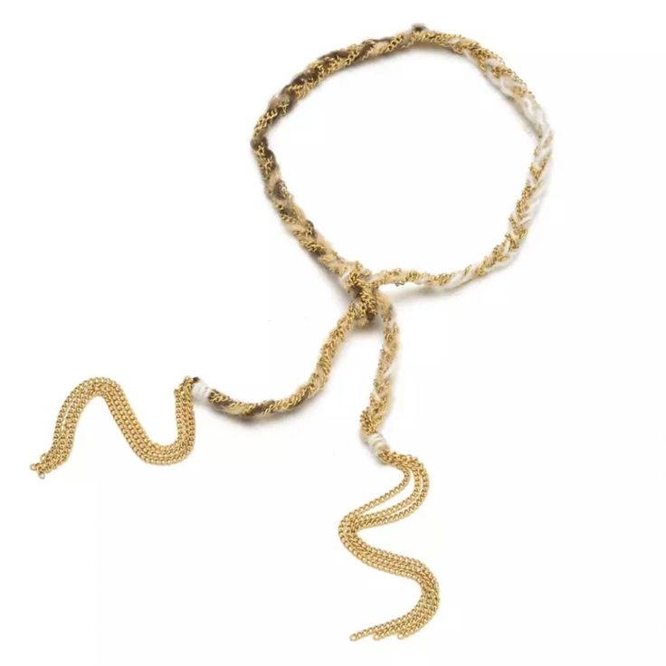 - Bohemian Style Elegant Look for any occasion - Braided golden metal and woven fabric makes this gorgeous piece - Handmade piece - Manually knot for closure - Length: 14” plus 3” chain tassel in each end - Adjustable, fits all - Make your own style, wear as many as you want to create your unique & personal look. - Infinite uses… Can be used as bracelet, choker, anklet and more. Adjustable Bohemian Lariat Bracelets, Adjustable Bohemian Lariat Bracelet, Adjustable Woven Gold Jewelry, Adjustable Braided Yellow Gold Jewelry, Adjustable Braided Gold Bracelets, Bohemian Necklace With Adjustable Length For Parties, Bohemian Party Necklace With Adjustable Length, Adjustable Braided Gold Jewelry, Adjustable Gold Necklace With Silk Cord