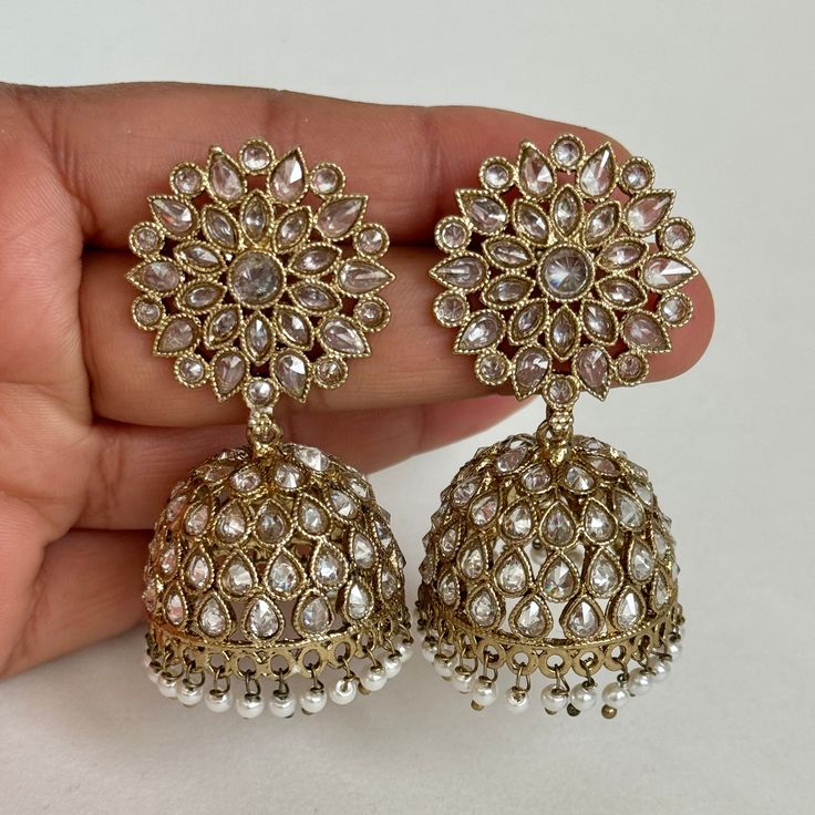 Antique Polki kundan Jhumka/stone Jhumka/Indian Jewelry/Pakistani Jewelry/Punjabi Jewelry/Statement earrings/Bridal earring/Indian wedding Length 2.25 inches Width 1 inche This is 100% Handmade jewelry. So Color, shades, texture displayed may slightly vary from the actual product due to digital image limitations. We request you to consider these minor variations. Please expect the possibility of some slight imperfections when buying hand made jewelry. If you have any questions, please message or Luxury White Jhumkas With Latkans, Luxury Kundan Jhumkas For Eid, Luxury Kundan Round Jhumkas, Luxury Festive Stone Work Jhumkas, Luxury Kundan Jhumkas With Gota Work, Luxury Kundan Temple Jewelry Jhumkas, Luxury Hand Set Jhumkas For Wedding, Indian Bridesmaids Earrings, Navratri Bridal Earrings With Meenakari Details