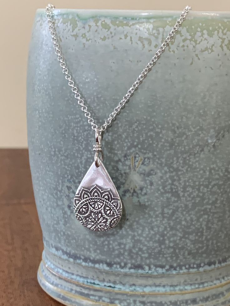 "Mandala Pendant, Sterling Silver Mandala Necklace, Inspirational Jewelry, Boho Jewelry, Teardrop Mandala, Spiritual Necklace, Mindfulness This sterling silver teardrop mandala pendant is beautiful and light weight. It has a bohemian and vintage feel to it. Mandalas symbolize that life is never ending....they also represent unity and harmony. We use only fine and sterling silver for all of our jewelry and findings, including our handmade ear wires. Our unique metalwork is shaped and hammered for Mandala Pendant, Spiritual Necklace, Mandala Necklace, Inspirational Jewelry, Vintage Lockets, Jewelry Boho, Ear Wires, Boho Jewelry, Locket