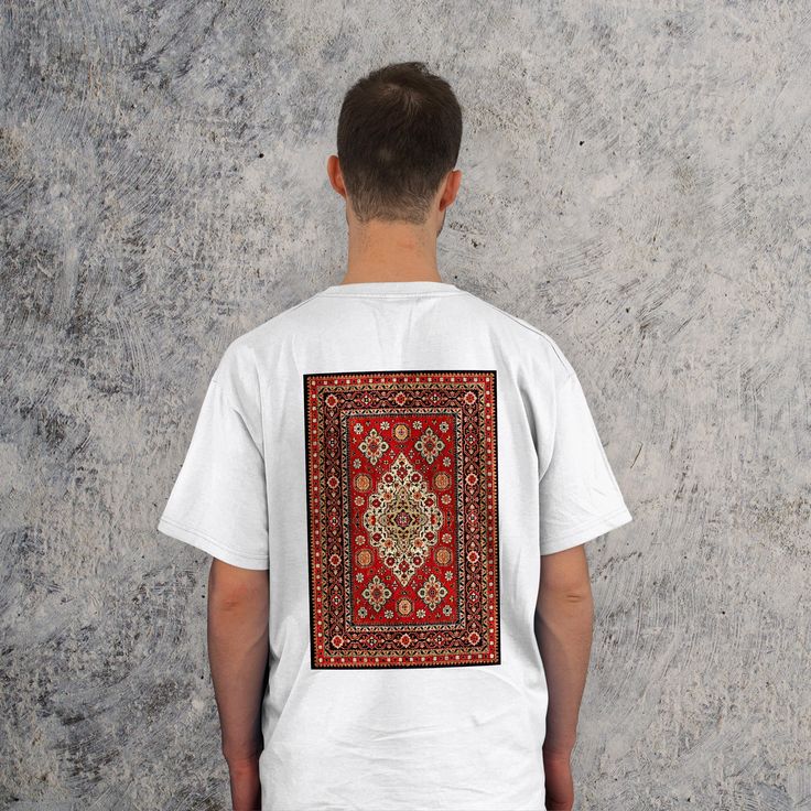 "Elevate your style with our Turkish Rug Tribe Front and Back Trendy Shirt - a unique blend of tradition and trend. This Antique Vintage Traditional Turkish Carpet T-shirt captures the essence of bohemian flair and Anatolian heritage. Embrace the beauty of the woven past with this Bohemian Wool Rug Tee.  #TurkishRugStyle #BohemianChic Feel free to take a peek at our other products and explore more delights! 👇 https://www.etsy.com/shop/irokoStudio - Gildan 5000 - Seamless double-needle collar - Bohemian Red Cotton T-shirt, White Bohemian Shirt With Crew Neck, White Bohemian Crew Neck Shirt, Bohemian White Shirt With Graphic Print, Red Bohemian Cotton T-shirt, White Bohemian Shirt With Graphic Print, Vintage Traditional, Trendy Shirts, Turkish Carpet