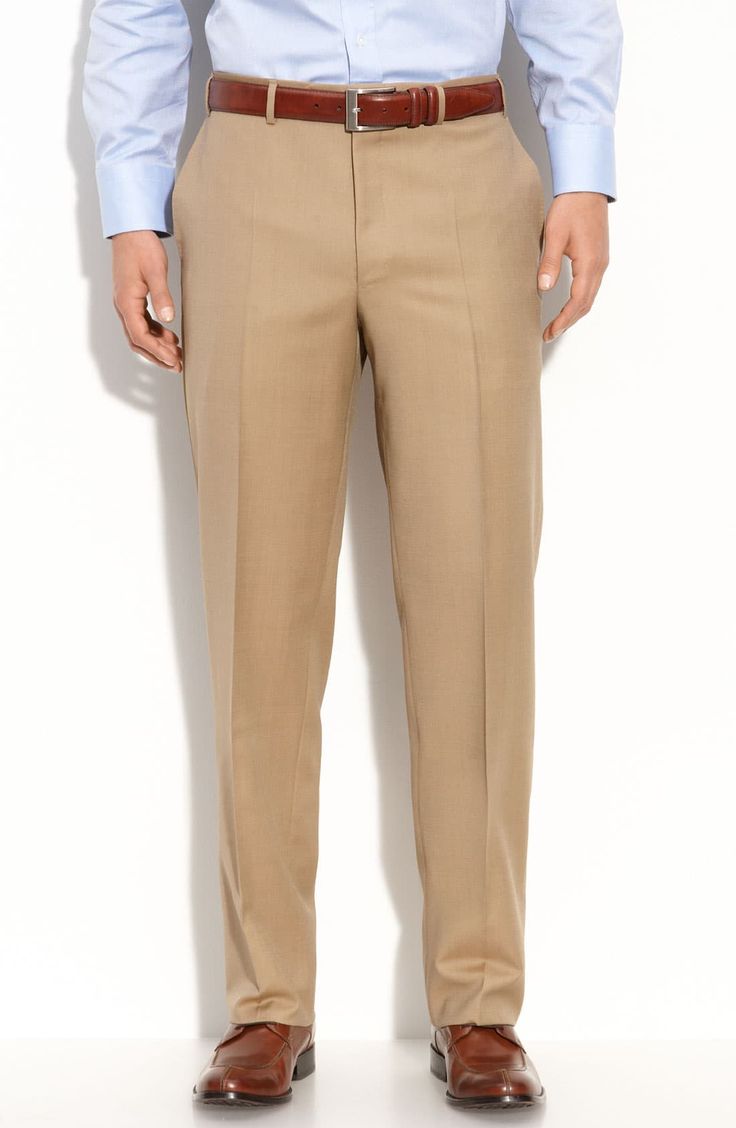 Italian wool adds a luxe style to staple flat-front trousers that offer a smart, modern look. 11" front rise; 17 1/2" back rise (size 60) 100% wool Dry clean Made in Italy Tailored Solid Wool Dress Pants, Formal Solid Wool Pants, Tailored Wool Dress Pants, Formal Solid Wool Dress Pants, Formal Wool Dress Pants In Solid Color, Tailored Wool Dress Pants For Semi-formal Occasions, Formal Wool Dress Pants With Flat Front, Semi-formal Wool Flat Front Dress Pants, Semi-formal Wool Dress Pants With Flat Front