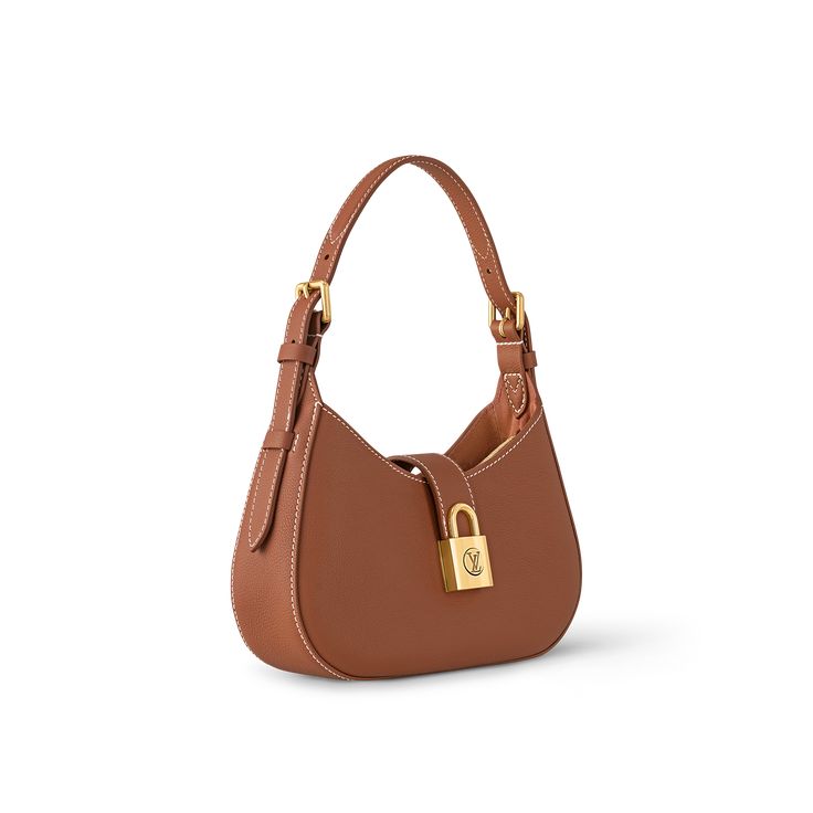 LOUIS VUITTON® - Low Key Shoulder Bag - Cognac Tan Designer Bag, Quite Luxury Bags, Quiet Luxury Accessories, Timeless Luxury Bags, Luxury Brown Shoulder Bag With Lock, Luxury Brown Bags With Lock, High-end Brown Bag With Turn-lock Closure, Brown Bags With Lock For Everyday Luxury, High-end Cognac Bags For Everyday Luxury