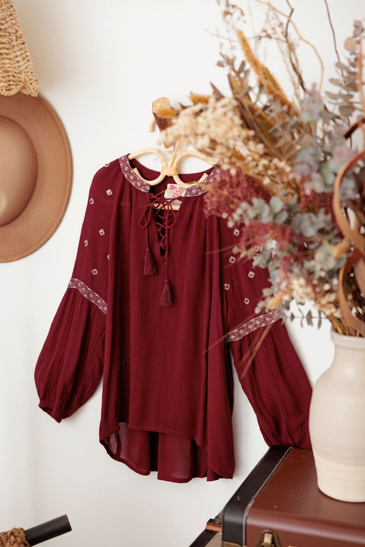 ♡ Look effortlessly stylish in our Ethnic Boho Embroidered Front Tie Girls Top. With its unique embroidered detailing and trendy front tie, this top will elevate your outfit to the next level. Designed for comfort with long sleeves, it's perfect for any occasion. Embrace your boho side and stand out from the crowd! ♡ Item Feature: ethnic boho, embroidered, front tie, long sleeve, light weight, beaded, festival, chic, stylish. Bohemian Blouse With Embroidered Hem For Fall, Bohemian Embroidered Peasant Top For Fall, Bohemian Fall Blouse With Embroidered Hem, Bohemian Cotton Blouse With Back Tassel Tie-up, Fall Bohemian Blouse With Embroidered Hem, Bohemian Tops With Embroidered Hem For Festivals, Bohemian Festival Top With Embroidered Hem, Peasant Style Embroidered Top With Floral Details For Fall, Peasant Style Embroidered Top With Floral Embroidery For Fall