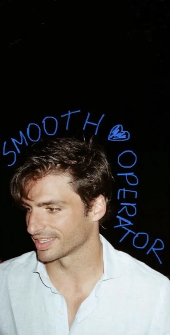 a man standing in front of a sign with words on it that say, smooth hair