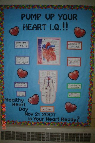 a bulletin board with images of heart health and words that read pump up your heart i q