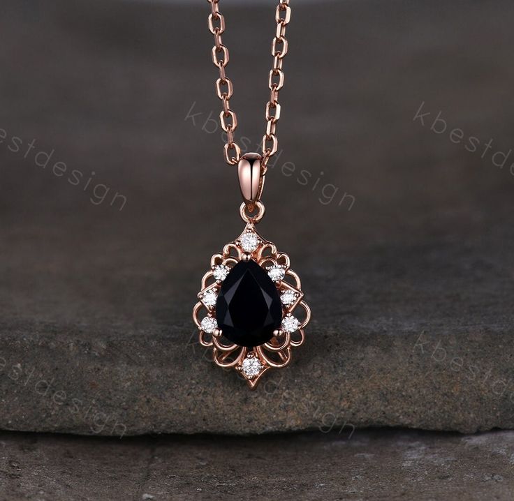 This is a 1.5CT Black Onyx Necklace. For those who are looking for black onyx jewelry which is handcrafted in details, this unique black onyx necklace would be a perfect choice for you. Whether it be a Birthday gift for her, an anniversary gift her, or a celebration of yourself, this black gemstone jewelry is the perfect gift from the heart. Details: *6x8mm pear cut Black Onyx *Side stone: Moissanite Chain: 18 Inches length. I accept custom making order. Please contact me if you need this servic Black Gem Jewelry, Onyx Pendant Necklace, Moissanite Chain, Black And Gold Necklace, Edwardian Necklace, Black Onyx Jewelry, Black Onyx Pendant, Onyx Pendant, Black Onyx Necklace