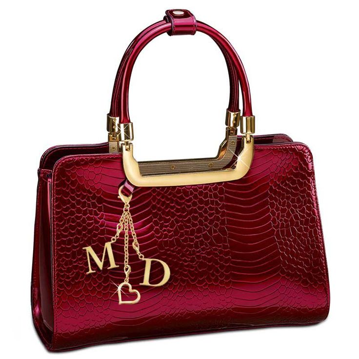 Exquisitely crafted in beautiful ruby-red, gloss-finish fine leather with an embossed mock-croc pattern, this is a designer-quality bag you’ll want to take everywhere! Gleaming golden accessories and a jet-black lining add the right amount of glamour. But to make this handbag truly unique to you, it comes with three golden dangling charms—a pretty heart and your initials!The Ruby Red Genuine Leather Handbag is big enough to fit all the essentials. Inside, the bag has a classic black lining and f Mobile Phone Pouch, Side Bag, Handbag Organization, Handbag Heaven, Burberry Handbags, Genuine Leather Handbag, Backpack Bag, Handbags Online, Womens Purses