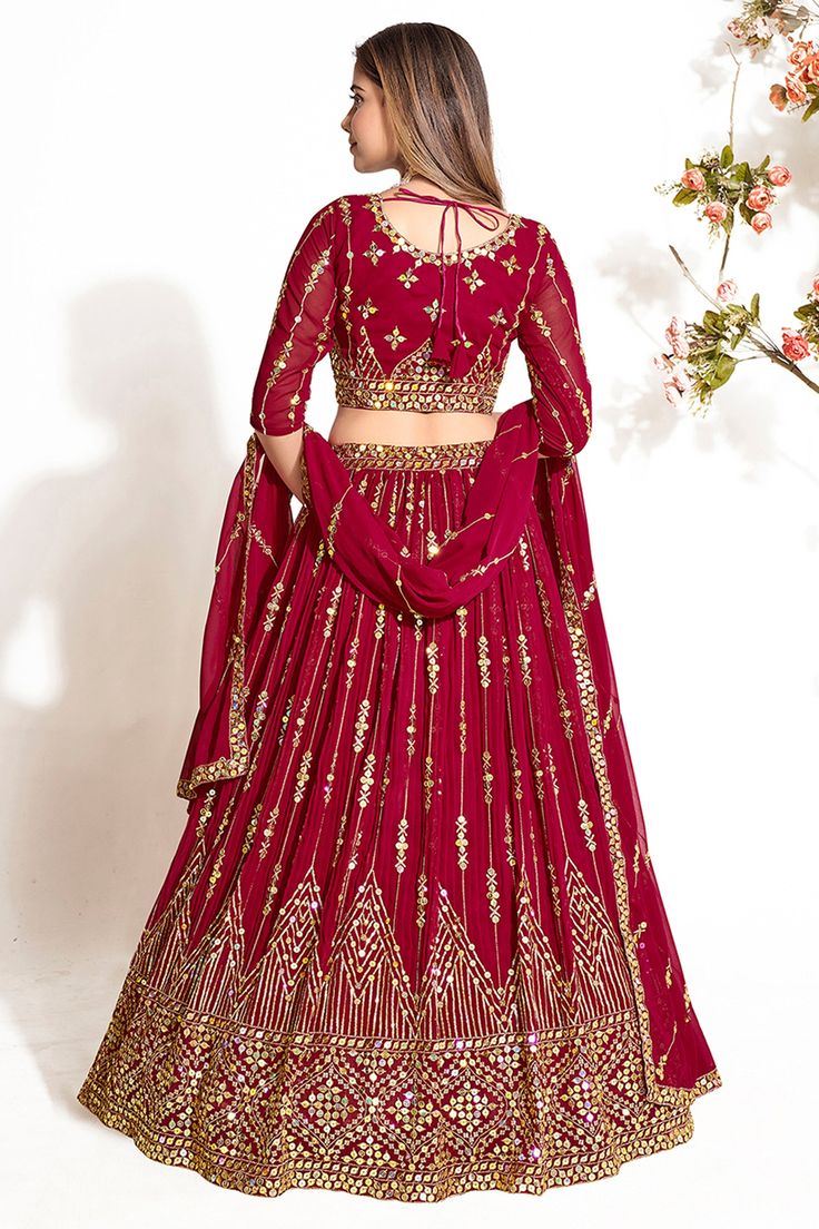 Dazzle the crowd in this exquisite designer lehenga, crafted from luxurious Art Silk fabric. The intricate sequins work adds a touch of glamour, making it perfect for special occasions and functions. The stunning craftsmanship and elegant design make this lehenga a must-have for your ethnic wardrobe. Step out in style and make a statement with this stunning ensemble. Red Chinon Sets With Mirror Work, Semi-stitched Red Sets With Mirror Work, Red Floor-length Sharara With Mirror Work, Festive Red Sets With Mirror Work, Red Semi-stitched Anarkali Set For Reception, Red Bollywood Sharara With Mirror Work, Red Festive Sets For Reception, Festive Red Sets For Reception, Red Mirror Work Sharara For Reception