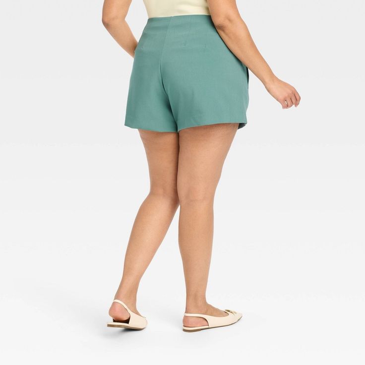 Create an array of cool and confident warm-weather looks with these High-Rise Tailored Shorts from A New Day™. Made from lightweight fabric with a hint of spandex, these high-rise shorts offer all-day cool comfort and easy movement. Designed with a fly hook and zipper, they feature two side pockets to add functional flair to your look, while the solid hue makes for easy pairing with different tops. A New Day™: Style that goes wherever you do. Relaxed Fit Bottoms With Built-in Shorts For Warm Weather, Versatile Lightweight Fitted Bottoms, Lightweight Fitted Versatile Bottoms, Versatile Fitted Lightweight Bottoms, Casual Bottoms With Built-in Shorts For Warm Weather, Warm Weather Bottoms With Built-in Shorts, Relaxed Fit Bottoms For Warm Weather Day Out, Versatile Stretch Shorts For Summer, Stretch Versatile Shorts For Summer