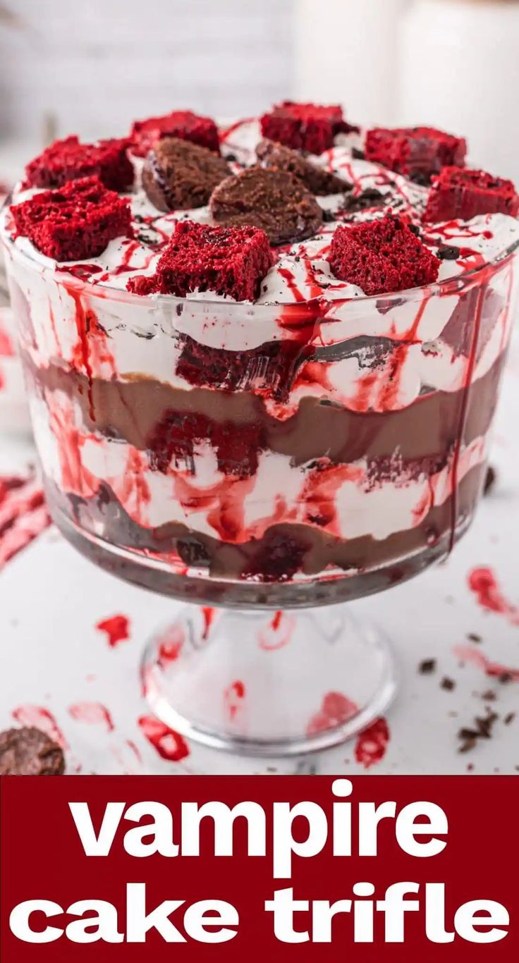 a red and white trifle cake on a plate with the words vampire cake trifle