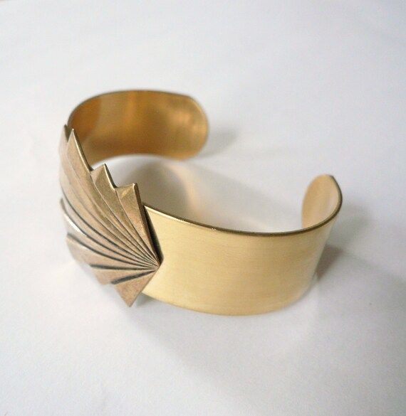 Elegant Gold Brass Cuff Bracelet, Elegant Brass Cuff Jewelry, Elegant Bronze Bracelets For Wedding, Antique Adjustable Cuff Bracelet For Formal Occasions, Elegant Adjustable Brass Cuff Bracelet, Elegant Brass Cuff Bracelet Gift, Retro Handmade Bangle Jewelry, Elegant Bronze Bangle As Gift, Elegant Antique Gold Bangle