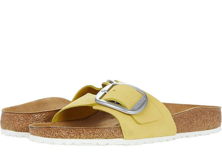 Birkenstock Madrid Big Buckle - Women's Sandals : Popcorn Nubuck : The Madrid Big Buckle by Birkenstock is the iconic style you love, with contemporary and bold buckles you'll love even more! Premium leather uppers with an open toe. Slip-on slide with an adjustable buckle closure. The leather lined, contoured cork footbed will mold to the shape of your foot creating a custom footbed that supports and cradles you each and every step. Raised toe bar is designed to encourage the natural gripping mo Casual Leather Slides With Tang Buckle, Modern Adjustable Footbed Sandals With Buckle Closure, Spring Cork Footbed Sandals With Buckle Closure, Casual Slides With Buckle Closure Made Of Cork, Spring Cork Sandals With Buckle Closure, Spring Slides With Rectangular Buckle Closure, Spring Suede Slides With Buckle Closure, Yellow Birkenstock, Gold Buckle Birkenstocks