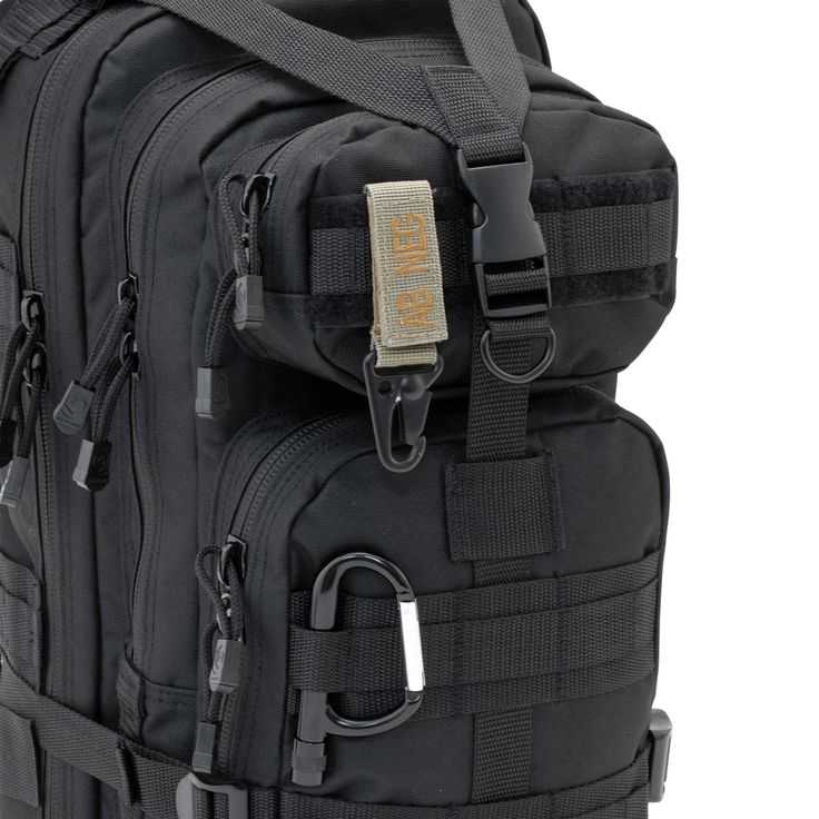 a black backpack with multiple compartments and straps