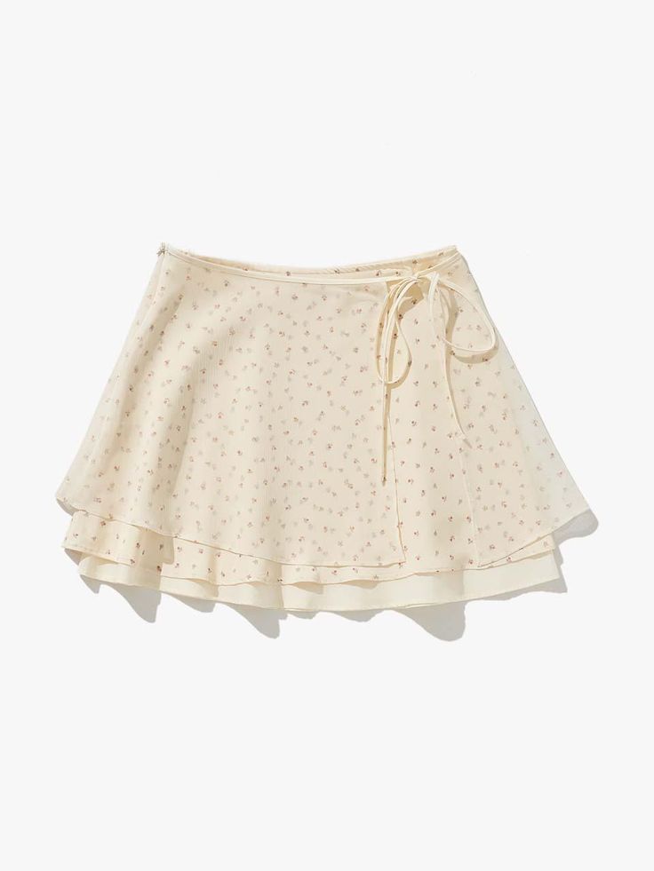 Soft and drapery, this relaxed fit mini skirt features layered panels and is accentuated with ditsy flower pattern throughout. Pair yours with various tops for a romantic mood. - Airy, breathable texture- Flare silhouette in mini length- Side zip fastenings- Adjustable strap detail at waist- Voluminous layered hem Feminine Cotton Mini Skirt, Cute Skirts Aesthetic, Sew Mini Skirt, Cotton Skirt Pattern, Feminine Flowy Mini Skirt With Lace Trim, Vintage Mini Skirt With Flowy Design, Feminine Mini Skirt With Lace Trim, Layered Skirt Pattern, Flower Skirts