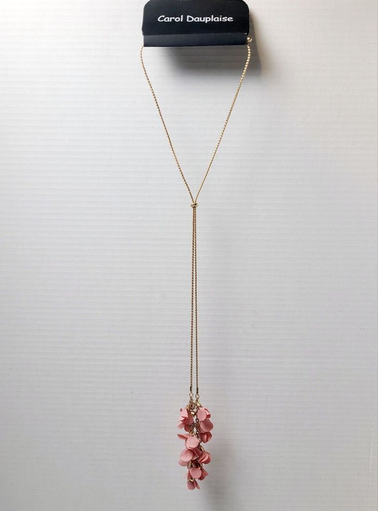 Add a touch of elegance to your outfit with this beautiful 32" Carol Dauplaise Gold Tone Lariat Necklace. The necklace is designed to complement any style and is perfect for both casual and formal occasions. The necklace is made of high-quality materials and is crafted to perfection, ensuring that it will last for years to come. The necklace is 32 inches long and features a lariat style that is both classic and timeless. The necklace is perfect for those who want to add a touch of sophistication to their look. Antique Jewelry Necklace, Your Outfit, Lariat Necklace, Vintage Watches, Formal Occasion, Antique Jewelry, Vintage Antiques, Jewelry Necklace Pendant, Jewelry Watches