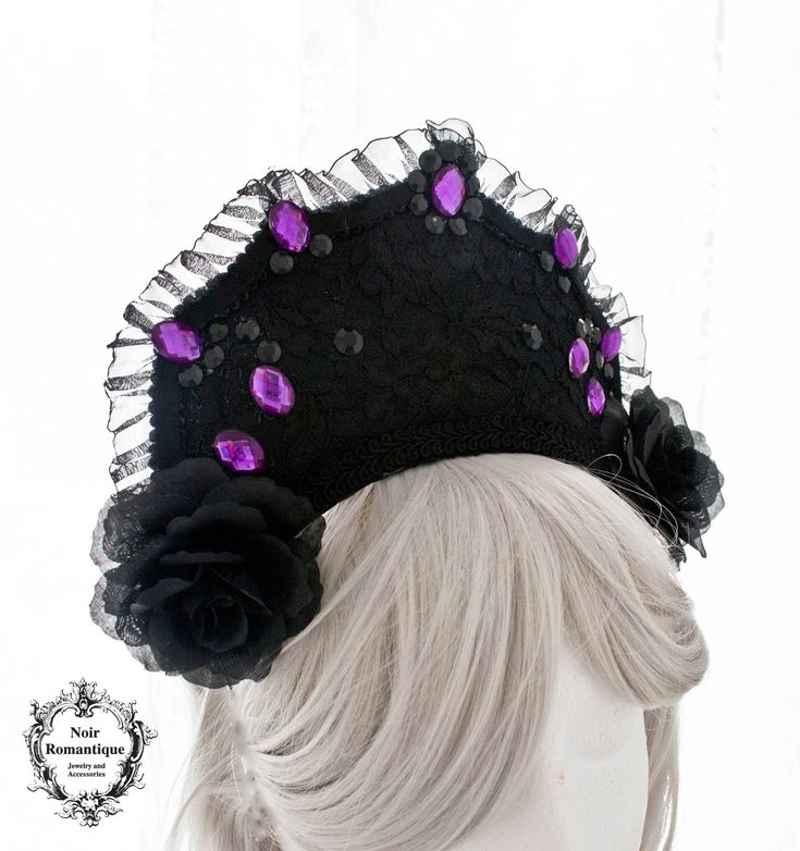 ♥♥Noir Romantique♥♥ Welcome to my store! A magnificent gothic headpiece influenced by old ages aristocratic headpieces with a bit of modern touch.This piece is made of black lace of high quality and decorated with trims ,black rhinestones,purple gems and two black flowers.It is set on a satin black headband. It can also be made in any colour of your choice,just ask for it :) It will be sent to you carefully wrapped in a safety box through registered mail. If you have any questions feel free to a Black High Crown Headpiece For Wedding, Gothic Crown For Party Costume Accessories, Gothic Crown Costume Hat For Masquerade, Gothic Crown Costume Accessories For Party, Gothic Crown Costume Accessories For Masquerade, Gothic Crown For Masquerade, Gothic High Crown Costume Accessories For Party, Gothic Crown Headpiece For Costume Party, Gothic High Crown Headpiece For Costume Party