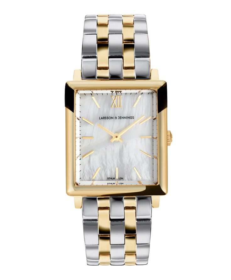 An iconic design, elevated. Combining the classic style of old vintage watches with an ultra-modern appeal in sumptuous and stylized mixed gold. The large square-shaped 40mm dial features roman numerals and an elegant pearlescent face making it an eye catching and versatile timepiece. Boyfriend pairs classic design with robust links made of mixed gold-plated stainless steel for an effortless yet captivating piece. Plate Movement, British Heritage, Swedish Design, Branded Gifts, Style Classique, Square Watch, Old Vintage, Roman Numerals, Watches Jewelry