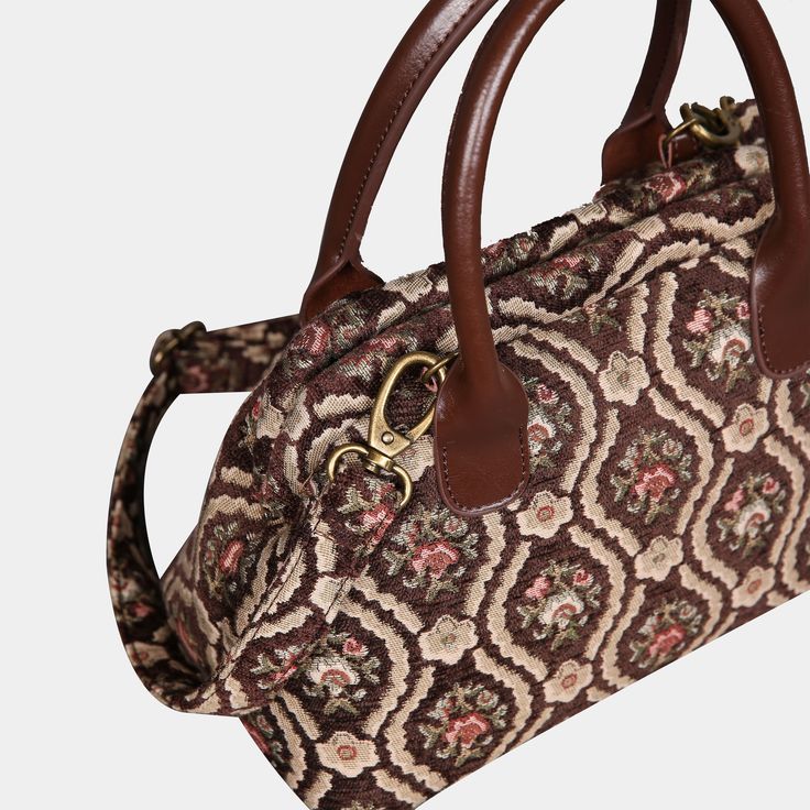 With a nod to the Victorian era, MCW’s freshly combines the classic and elegant design of the traditional carpet bag with a textural and tactile twist.The main body of the bags is made with thick chenille carpets. The handles and belts are genuine leather with heavy cotton canvas lining. Every bag comes with a detachable and adjustable shoulder strap (55 inches) made from the same chenille as the bag and fixed with high-quality bronze hookers on the two ends.The carpet hand bag size is perfect f Vintage Tapestry Shoulder Bag With Leather Handles, Brown Tapestry Shoulder Bag With Double Handle, Brown Tapestry Bags With Double Handle, Brown Tapestry Double Handle Bags, Vintage Tapestry Bag With Adjustable Strap, Vintage Tapestry Bags With Leather Handles, Brown Tapestry Bags With Adjustable Strap, Brown Tapestry Shoulder Bag With Handles, Brown Tapestry Bag With Top Carry Handle