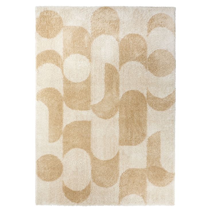 a beige rug with circles on it