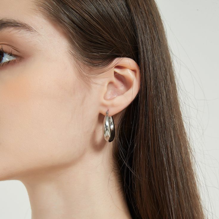 Minimal and classic silver hoop earrings. Your go to every-day earrings that adds a chic and vintage look to your outfit. The earrings are made from 316L surgical level stainless steel. A perfect addition to your jewelry collection! ………………………………….D E T A I L S• Materials: Stainless steel• Inner Diameter: 15mm• Outter Diameter: 25mm• This product is hypoallergenic, water and tarnish resistant Elegant Tarnish Resistant Silver Hoop Earrings, Elegant Silver Tarnish-resistant Hoop Earrings, Minimalist Metal Hoop Earrings With Polished Finish, Classic Metal Hoop Earrings For Everyday, Silver Tarnish Resistant Hoop Earrings, Silver Tarnish-resistant Hoop Earrings, Tarnish Resistant Silver Hoop Earrings, Chic Silver Hoop Earrings Tarnish Resistant, Chic Polished Silver Hoop Earrings