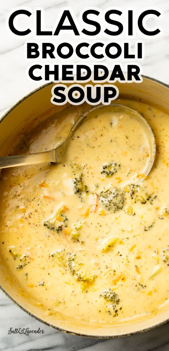 a bowl of broccoli cheddar soup with a spoon in it