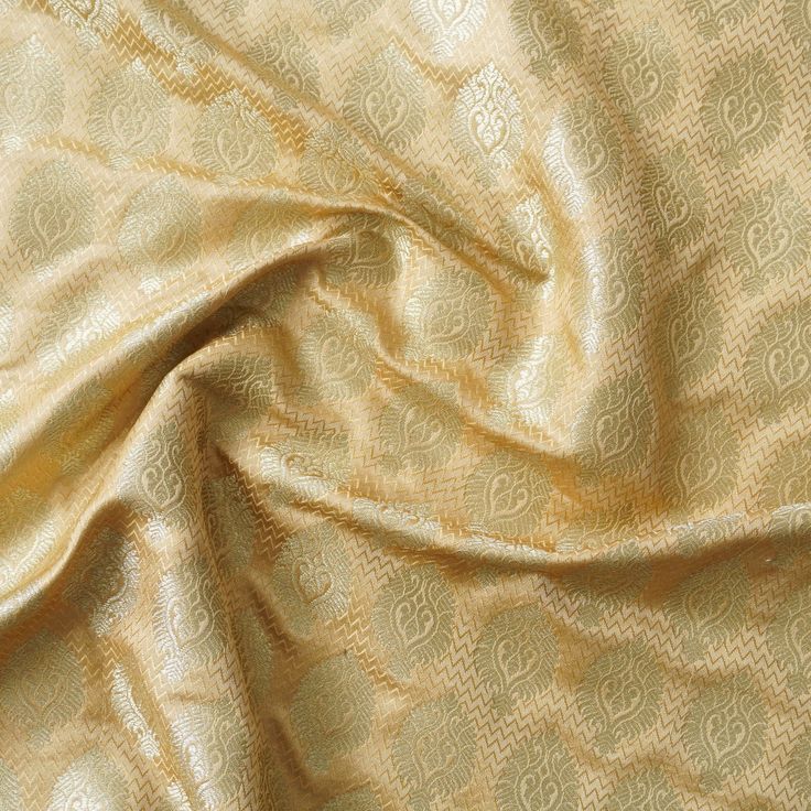 Category: Silk Brocade Khinkhwab brings you beautiful fabrics and yardage from Banaras. You can turn these beautiful banarasi brocade fabrics into a traditional blouse, Indian kurta or a western jacket. For Blouse you need 1 meter of fabric, for kurta you need 3 meters, for jackets you need 2 meters of fabric. Pair these beautiful fabrics with your Banarasi sarees and dupattas and add more glamour to it. Fabric: Semi Silk Brocade Price mentioned is for one meter. Width is 46 inches. Note- There Festive Formal Brocade Fabric, Gold Jacquard Fabric In Traditional Style, Festive Gold Raw Silk Fabric, Gold Brocade Fabric With Zari Weaving For Festivities, Gold Brocade Fabric With Zari Weaving For Festive Occasions, Gold Art Silk Fabric For Festivals, Gold Fabric With Zari Weaving For Festive Season, Gold Brocade Dupatta With Woven Motifs, Gold Silk Fabric For Diwali