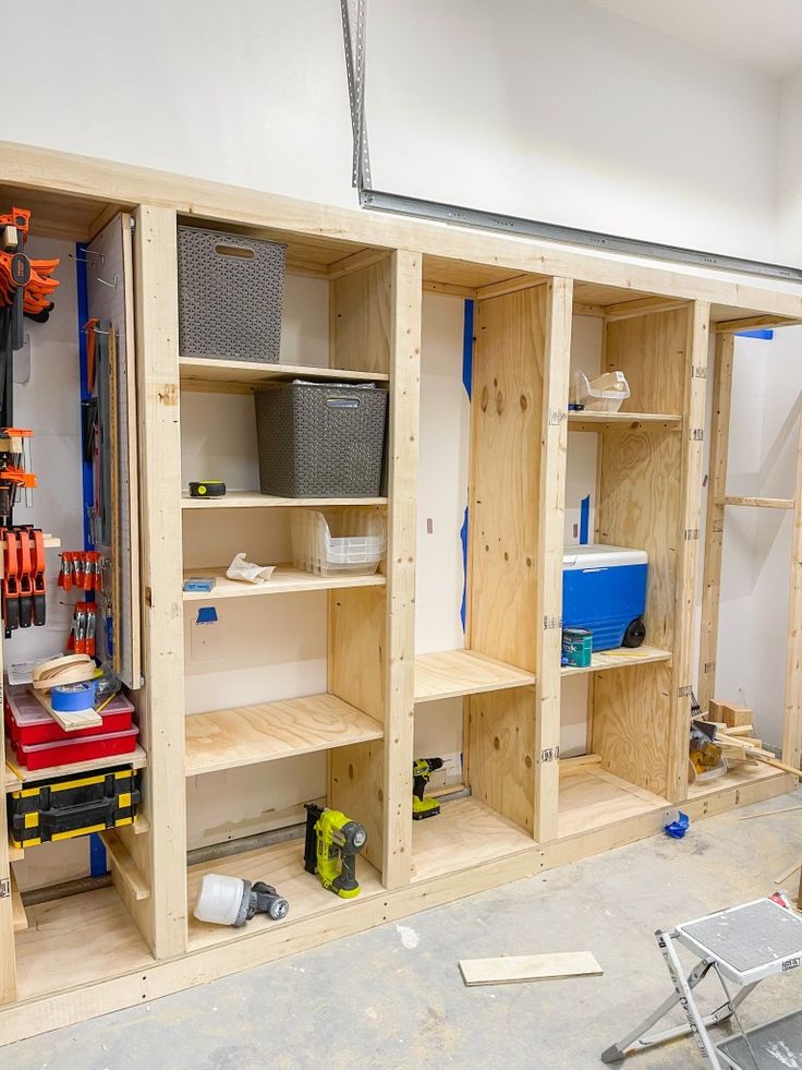 the shelves are being built and ready to be put into place in the garage area