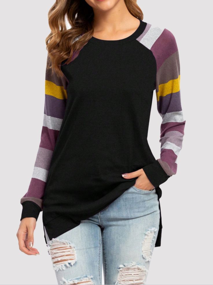 Bring some fun to your wardrobe with our Color Block Round Neck Long Sleeve T-Shirt! Made of comfortable and soft material, this shirt features a unique color block design that will add a pop of color to any outfit. The round neck and long sleeves make it perfect for any weather. Show off your playful style with this versatile shirt. Features: Basic style Sheer: Opaque Stretch: Highly stretchy Material composition: 95% polyester, 5% elastane Care instructions: Machine wash cold. Tumble dry low. Black Long Sleeve Color Block Tops, Fall Crew Neck T-shirt With Splicing, Black Color Block Long Sleeve Sweatshirt, Fall Splicing Crew Neck T-shirt, Black Long Sleeve Color Block Sweatshirt, Casual Long Sleeve Sweater With Color Matching, Casual Contrast Long Sleeve Sweatshirt, Casual Long Sleeve Sweater With Striped Sleeves, Casual Long Sleeve Sweater With Contrast Colors