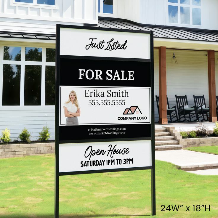 a real estate for sale sign in front of a house