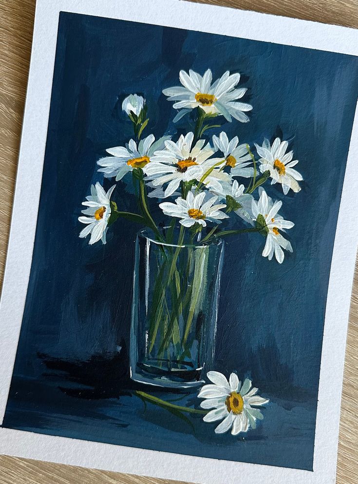 a painting of white daisies in a glass vase on a wooden table with blue background