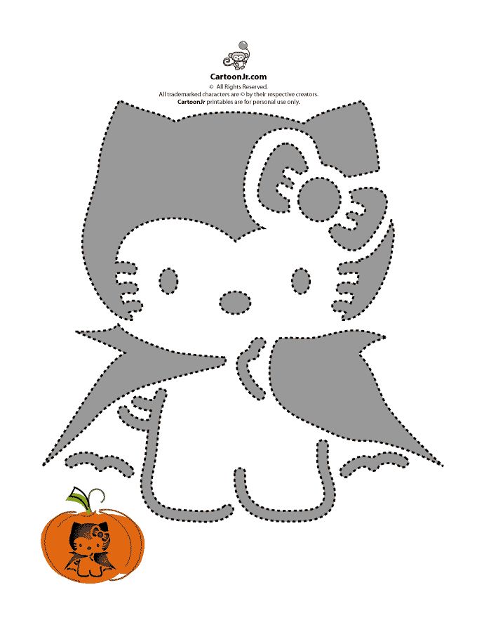 an image of a hello kitty cut out with pumpkins on the side and in the middle