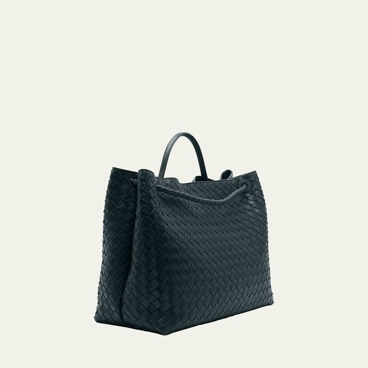 Bottega Veneta "Andiamo" tote bag in intrecciato napa leather  Rolled top handle  Open top with magnetic closure; center adjustable knot strap  Interior, one zip pocket and one slip pocket  Approx. 13.8"H x 16.5"W x 7.1"D Made in Italy Leather Bag With Intrecciato Weave And Top Handle, Modern Bag With Intrecciato Weave And Double Handle, Modern Bags With Intrecciato Weave For Errands, Luxury Satchel With Braided Handles For Travel, Modern Satchel With Braided Handles For Errands, Modern Intrecciato Weave Bag For Errands, Luxury Woven Leather Bag With Double Handle, Luxury Satchel With Braided Double Handles, Modern Satchel With Intrecciato Weave For Daily Use