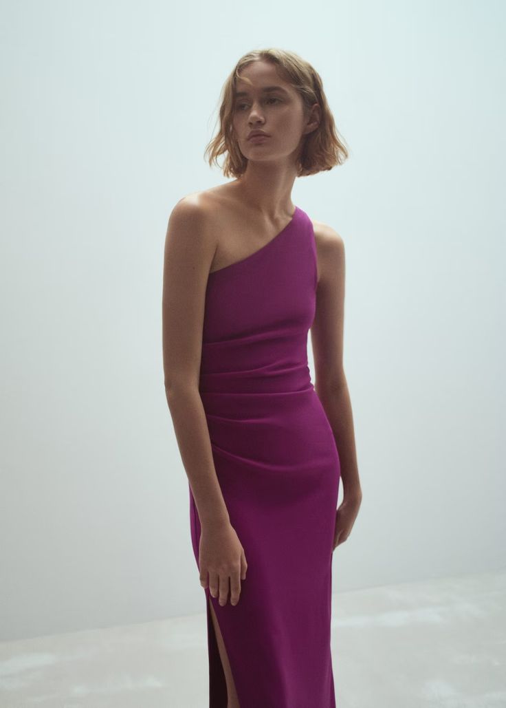 Asymmetrical maxi-bow dress - Women | Mango USA Pre-draped One Shoulder Maxi Dress For Party, Chic Midi Dress With Asymmetrical Neckline For Wedding Guest, Chic Asymmetrical Neckline Dress For Wedding Guest, Chic Asymmetrical Ruched Dress For Gala, Chic Asymmetrical Dress For Wedding Guest, Elegant Sleeveless Asymmetrical Dress For Wedding Guest, Chic Spring Evening Dress With Asymmetrical Hem, Chic Evening Dress With Asymmetrical Hem For Spring, Spring Evening Dress With Asymmetrical Neckline For Wedding Guest