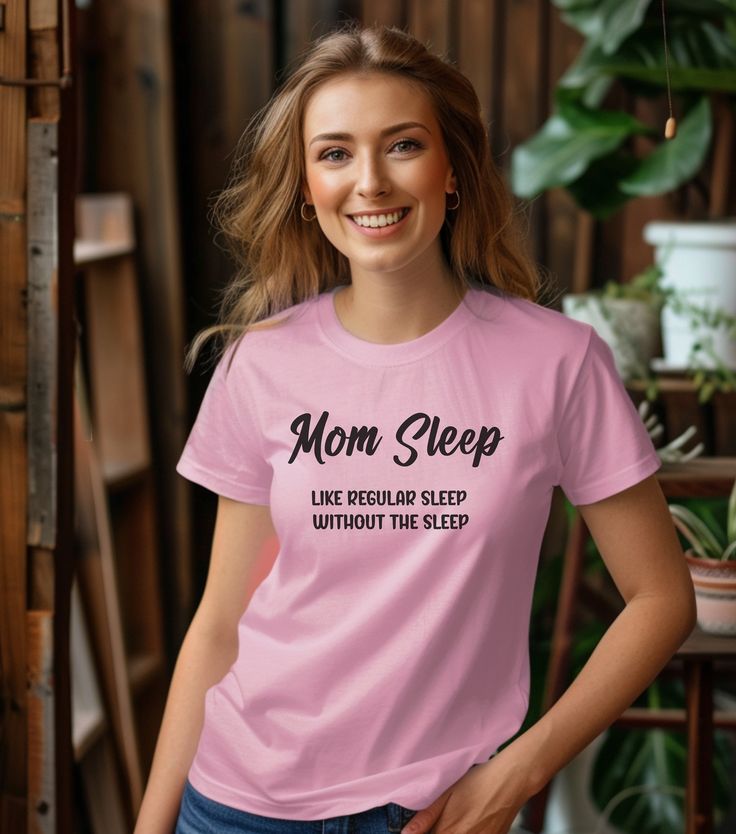 "Introducing the perfect shirt for all the hardworking and sleep-deprived moms out there - the Funny Mom Sleep Shirt! With its soft and cozy material, this shirt will provide you with the comfort you need to catch up on those much-needed Zs. It makes a perfect Mothers Day gift. But just because you're catching up on sleep doesn't mean you can't have a little fun. The Funny Mom Sleep Shirt features a hilarious and relatable design that will have you and your fellow mom friends giggling all night long. And with its loose and flowy fit, you can move around comfortably in your sleep without feeling constricted or uncomfortable. And let's not forget the powerful message this shirt sends. The \"Mom Power\" slogan is a reminder that even when you're sleep-deprived and exhausted, you're still a su Comfortable Crew Neck Bedtime Tops, Comfortable Crew Neck Top For Bedtime, Casual Letter Print Top For Bedtime, Short Sleeve Tops With Letter Print For Bedtime, Bedtime Letter Print Crew Neck Tops, Comfortable Pink Sleep Tops, Casual Crew Neck T-shirt For Bedtime, Casual Cotton T-shirt For Bedtime, Short Sleeve Letter Print Sleep T-shirt