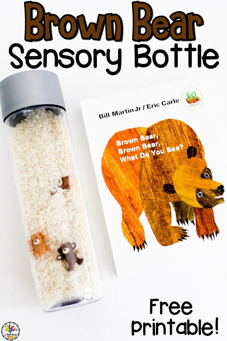 the brown bear sensory bottle is next to a book