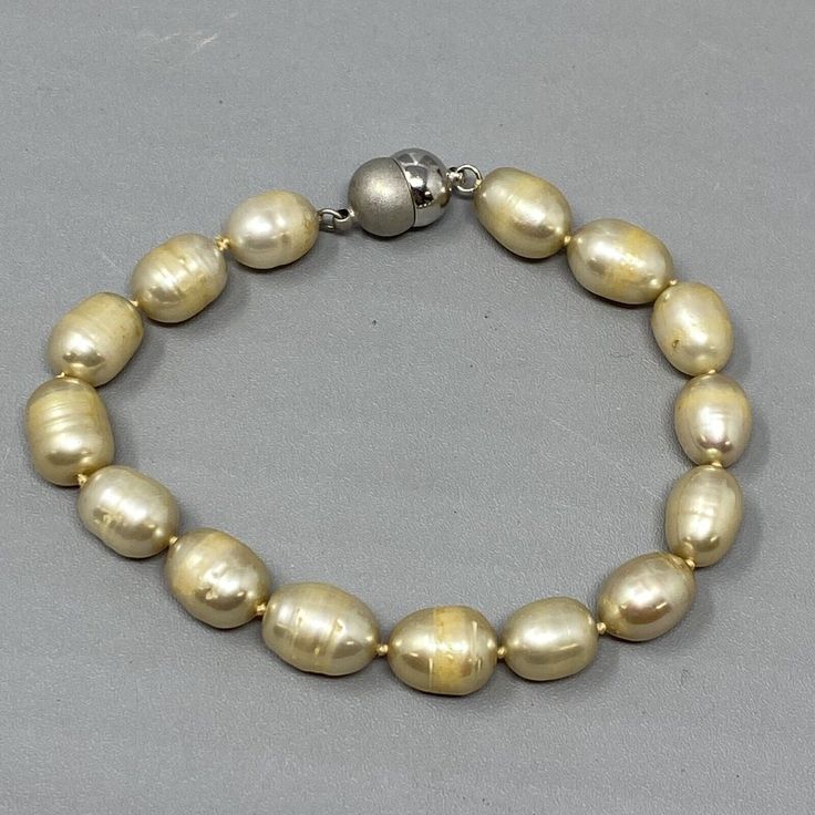 Genuine Pearl Bracelet Cream Baroque Beads Vintage Hand Knotted Magnetic Clasp Elegant Gold Stretch Bracelet With Large Beads, Elegant Gold Bracelets With Large Beads, Elegant Large Beads Bracelets For Party, Elegant Large Beads Bracelet For Party, Elegant Party Bracelets With Large Beads, Elegant Large Beaded Bracelets For Party, Elegant Silver Beaded Bracelet With Oval Beads, Gold Faceted Oval Bead Bracelets, Elegant Party Stretch Bracelet With Large Beads