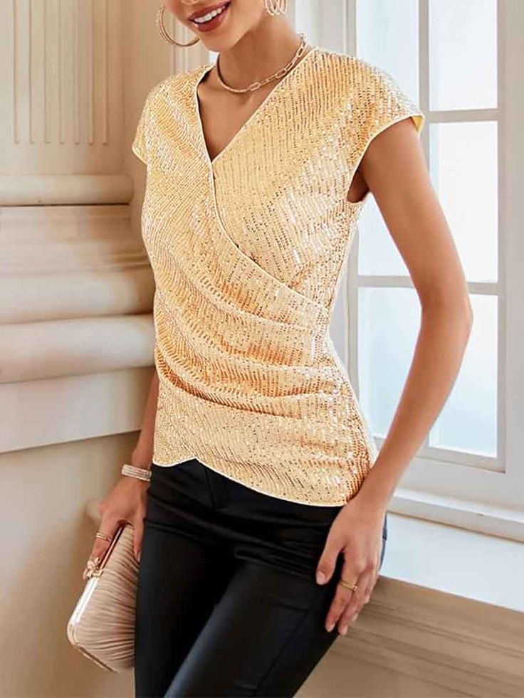 Champagne sequin shirt features 💖Glittery Sequin Fabric: This champagne sequin shirt features a soft lining that prevents skin irritation and ensures maximum comfort. The high-quality sequin fabric retains its shine even after washing, doesn't peel or fade, and provides full coverage without being sheer.💖UNIQUE DESIGN: This shirt features dazzling champagne sequins all over. The sequin shirt features a beautifully designed wrap front, fully lined, wraparound V-neck, cap sleeves and front twist Fitted V-neck Top With Contrast Sequin, V-neck Shimmer Tops For Party Season, Glamorous Stretch Top With Sparkling Details, Glamorous Sparkling Stretch Top, Glamorous Stretch Top With Contrast Sequin, Fitted Shiny Top For Spring, Fitted Tops With Shine For Spring, Stretch Tops With Contrast Sequin For Night Out, Glitter Tops For Party Season With Short Sleeves