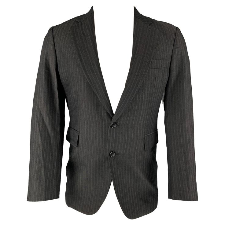 CoSTUME NATIONAL sport coat comes in a black stripped wool blend woven material featuring a notch lapel, flap pockets, and a double button closure. Made in Italy.Excellent Pre- Owned Material. Marked: 38 Measurements: Shoulder: 16.5 inches Chest: 38 inches Sleeve: 24 inches Length: 30 inches Reference: 126094 Category: Sport Coat More Details Brand: CoSTUME NATIONAL Size: 38 Chest Size: 38 Gender: Male Color: Black Pattern: Stripe Fabric: Wool Blend Style: Notch Lapel Age Group: Adult Azzedine Alaia, Costume National, Striped Fabrics, Jean Paul Gaultier, Black Pattern, Sport Coat, Black Stripes, Blazer Jacket, Wool Blend