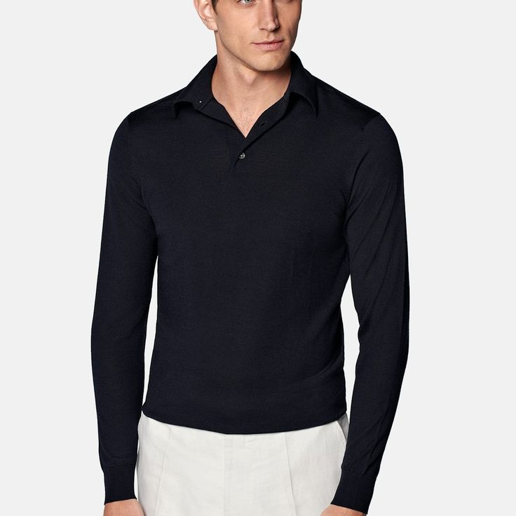 Dress it up under a tailored jacket or swap your shirt with it for a more casual anytime style-this navy long-sleeve polo shirt is an easygoing seasonal must-have. Blue Long Sleeve Polo Sweater For Work, Navy Long Sleeve Top For Work, Collared Business Tops For Winter, Collared Tops For Business In Winter, Classic Long Sleeve Top With Ribbed Collar, Long Sleeve Sweater With Seamless Collar For Work, Long Sleeve Cotton Polo Shirt For Business Casual, Classic Fall Business Tops, Classic Business Tops For Fall