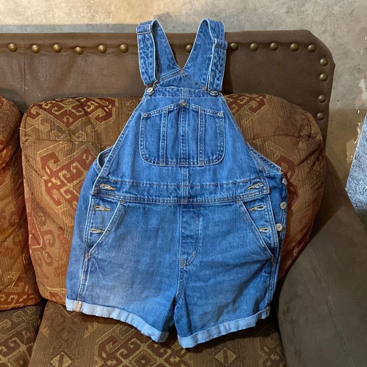 Size Xs Old Navy Denim Overall Shorts, New Without Tags. Perfect Condition. The Material Is Really Good It’s Thick But Not Too Heavy. Each Side Has 3 Buttons To Get Them On/Off Easier. Has Multiple Pockets, Including A Cute One Right In The Chest Area. Straps Are Adjustable And Buckle/Unbuckle. High Rise Medium Wash Cotton Shortalls, Blue Denim Washed Shortalls, Blue Washed Denim Shortalls, Retro Blue Jean Shorts With Pockets, High Rise Denim Blue Cotton Shortalls, Denim Shortalls With Pockets, Short Denim Shortalls With Pockets, Dark Wash High Rise Denim Shortalls, High Rise Dark Wash Denim Shortalls