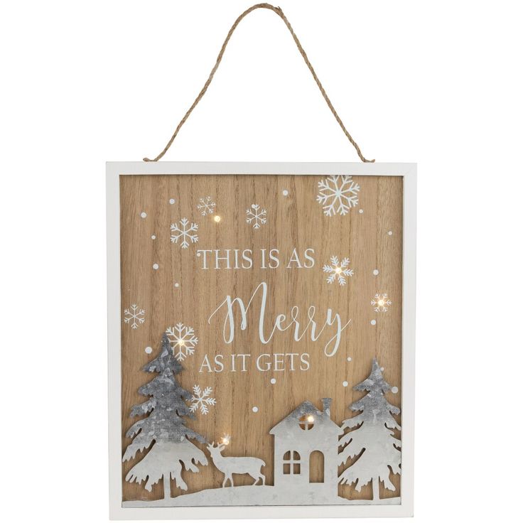 a wooden sign that says, this is as merry as it gets with trees and snowflakes