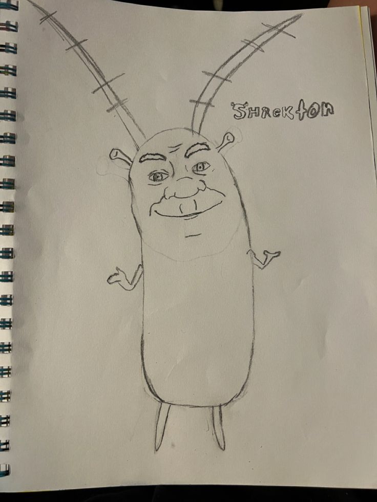 a pencil drawing of a cartoon character with horns on it's head and eyes