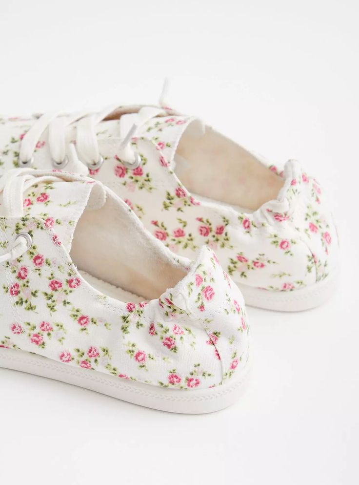 In a lightweight floral canvas, these sneakers give you the best of both worlds with a design that’s as practical as it is pretty. Our unique fit gives you extra wide width and extra room around your whole foot. EXTRA WIDE WIDTH (WW). Round toe. Lace-up top. Extra cushioned footbed; rubber sole. Man-made materials. Imported extra wide width shoes. The best plus size women's riley ruched sneaker (ww) sneakers in floral made of canvas. Rock your look from Torrid to Festivals like Coachella and Lol Trendy Floral Print Sneakers For Spring, Floral Print Textile Lace-up Sneakers, Comfortable Low-top Canvas Shoes For Spring, Cotton Sneakers For Everyday Spring Wear, Everyday Cotton Sneakers For Spring, Cotton Everyday Sneakers For Spring, Floral Print Textile Sneakers For Spring, Comfortable Spring Canvas Shoes With Laces, Spring Comfortable Canvas Shoes With Laces