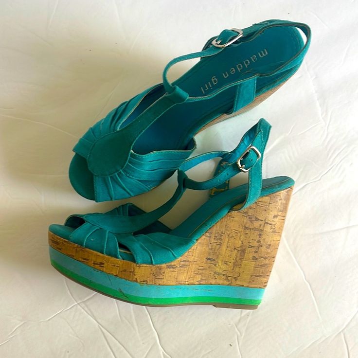 Maddie Girl Turquoise Wedges Sandals Size 6 Fabric Material. Never Worn But Notice The Straps Peeling On The Inside From Being Stored. Turquoise Synthetic Sandals For Spring, Summer Turquoise Ankle Strap Heels, Turquoise Ankle Strap Heels For Summer, Summer Ankle Strap Sandals In Turquoise, Turquoise Wedge Heel Sandals For Beach, Turquoise Ankle Strap Sandals For Summer, Turquoise Round Toe Heels For Summer, Turquoise Synthetic Sandals With Round Toe, Turquoise Round Toe Synthetic Sandals